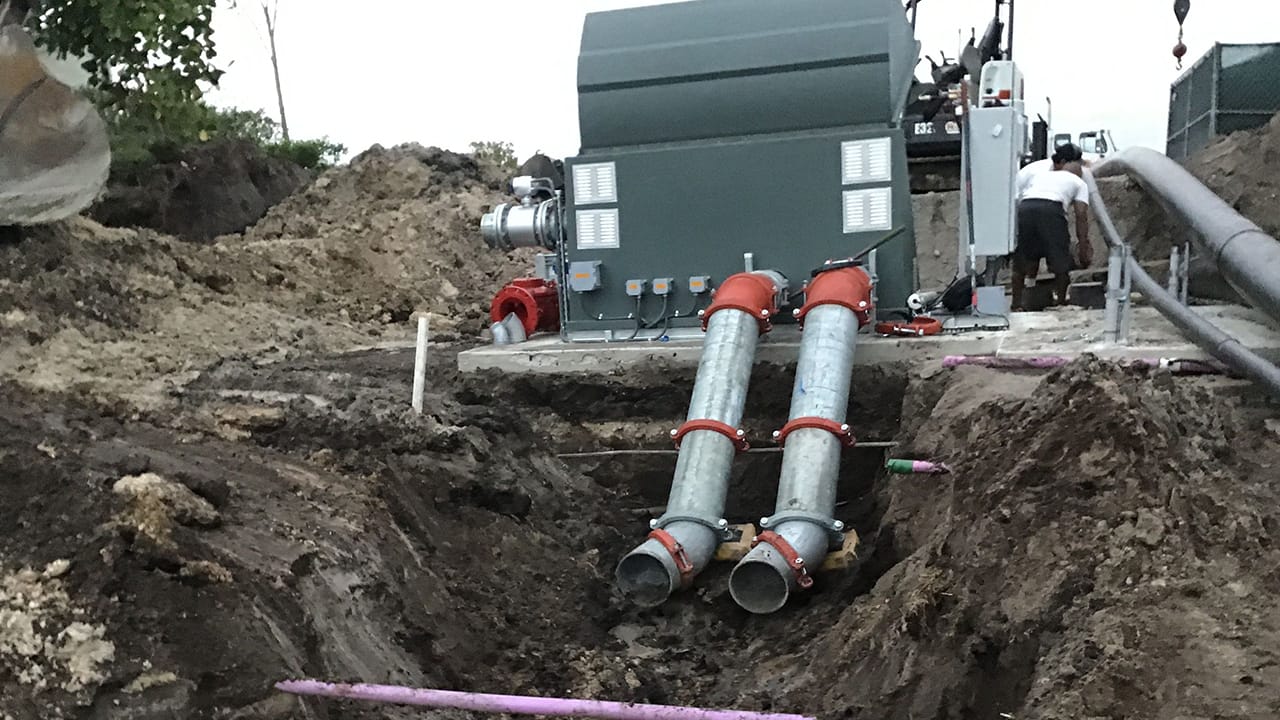 Pump station being installed into the ground