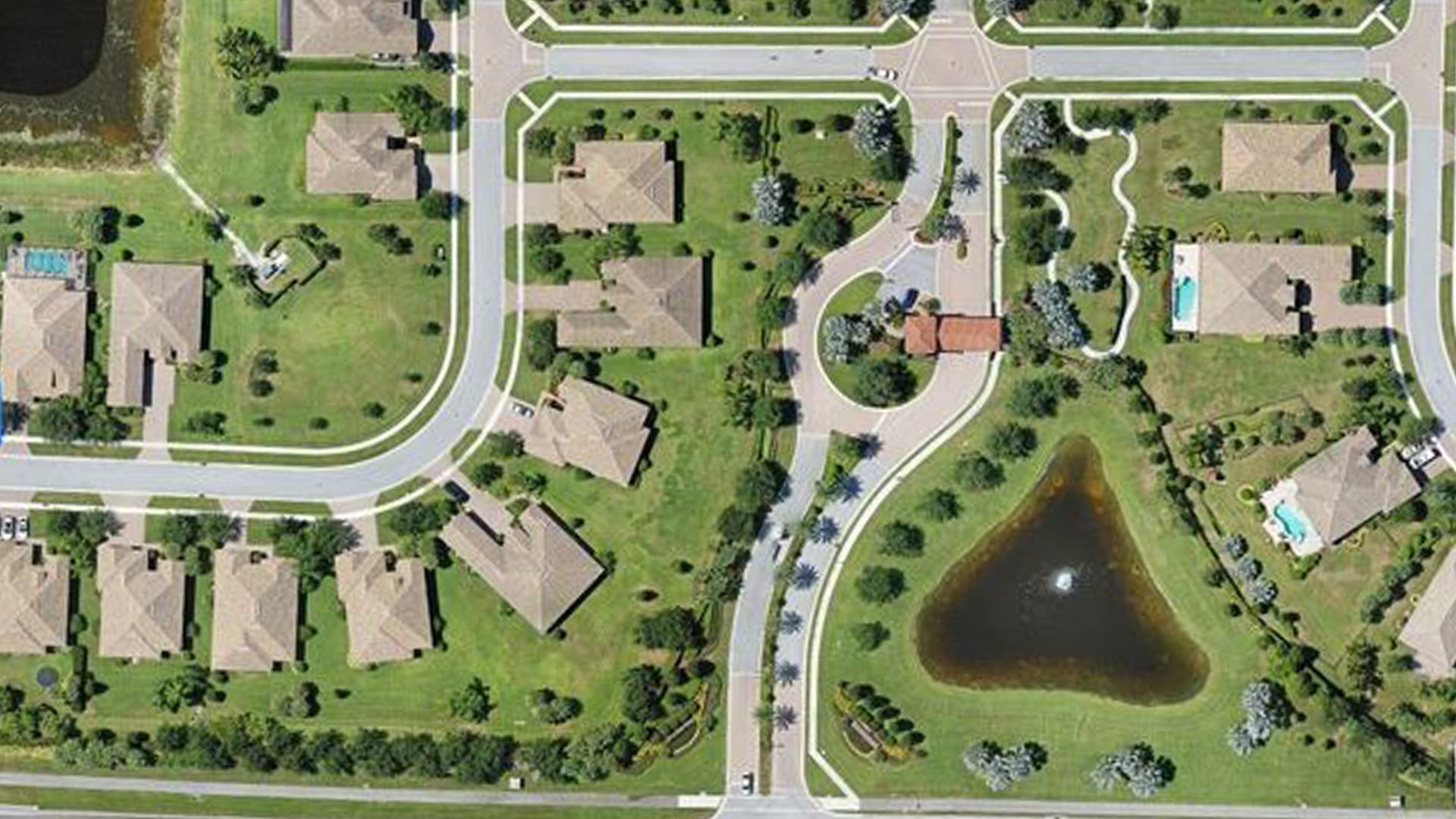 Birdseye view of a housing estate showing grass health