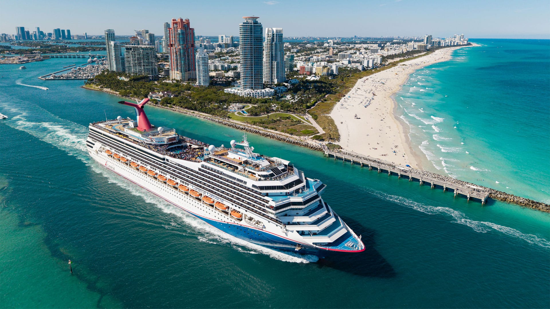 Cruise ship sailing next to the coast