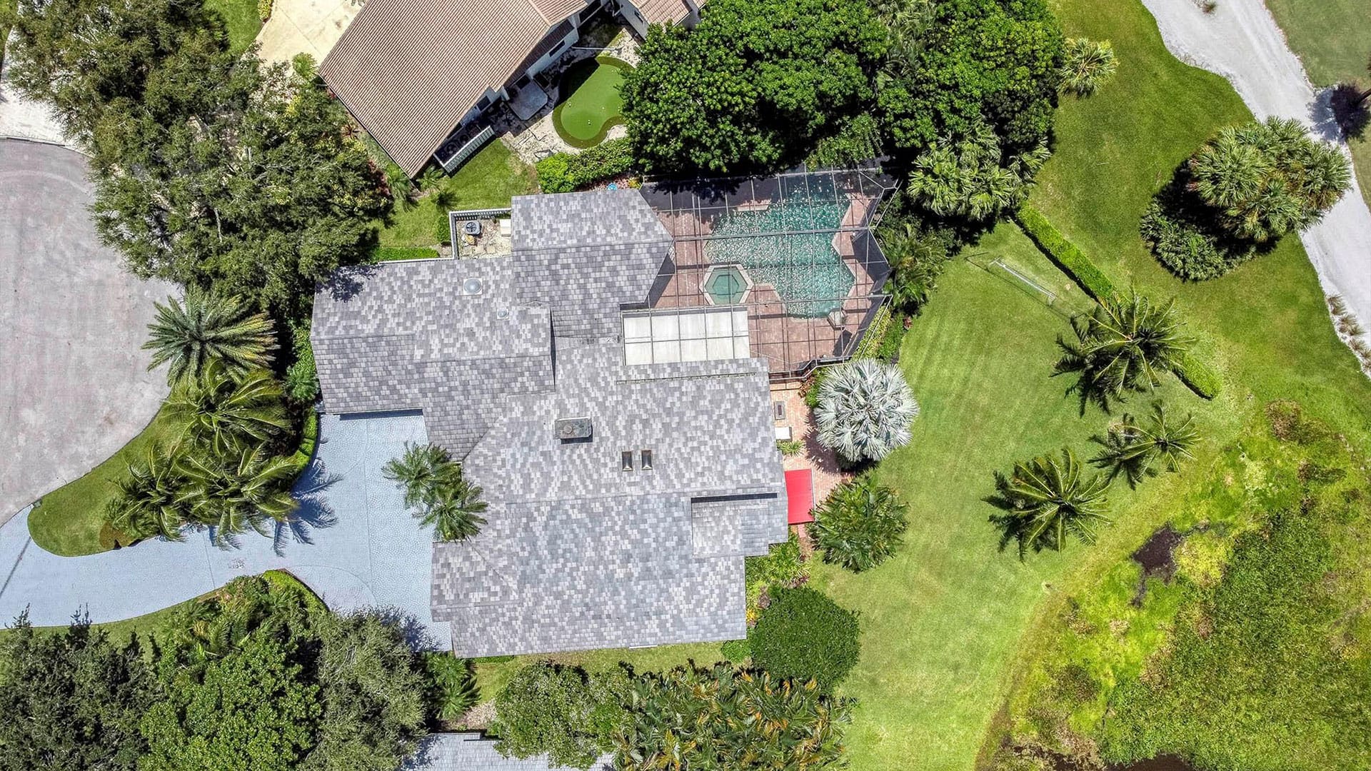 PGA National drone view of buildings, trees and grass