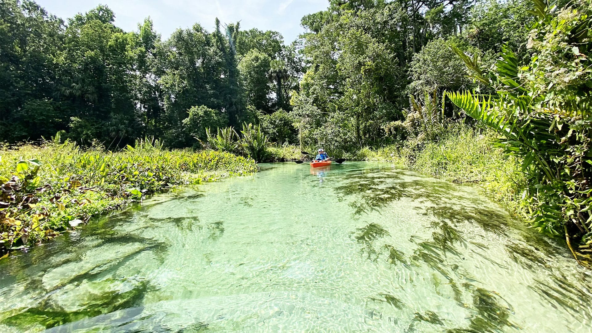 Red kayak on river during daytime in Jacksonville