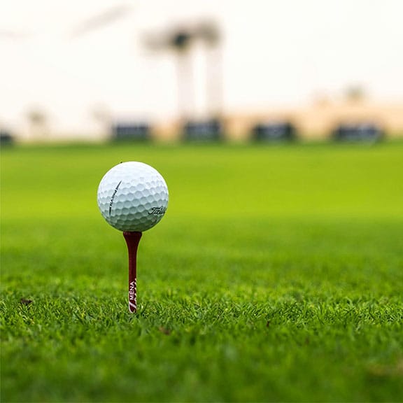 Close up of a golf ball on a tee