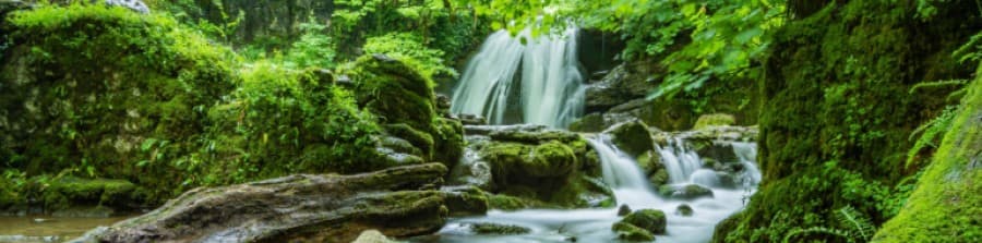 Water falling between rocks on a river